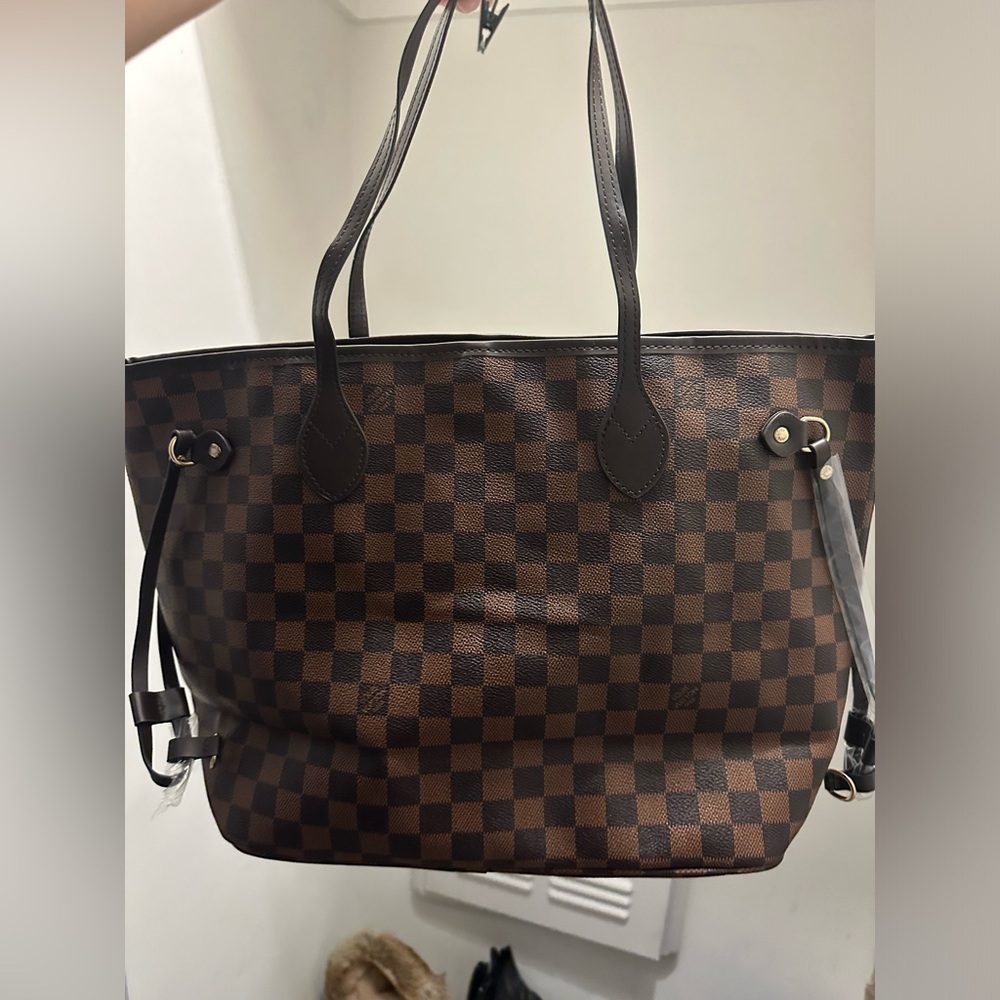 Knock Off Louis Vuitton Bag, comes with wallet. Never used, plastic still on it